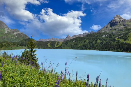 Reservoir lake with mountains epic landscape. Idyllic reservoir Kops lake at 1800 m in austrian Galtur, Vorarlbergの写真素材