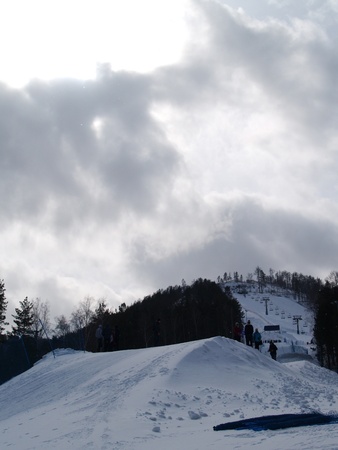 clouds over the snow mountainの写真素材