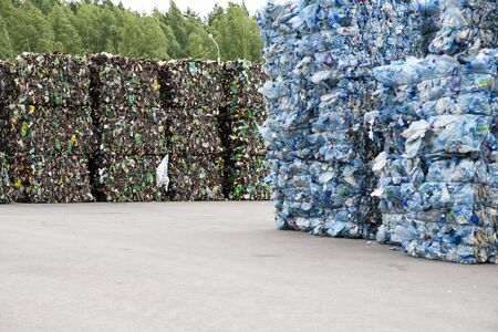 Minsk, Belarus -June 6, 2019 A pile of extruded plastic bottles at a garbage collection plant. Sorting and recycling plastic.のeditorial素材
