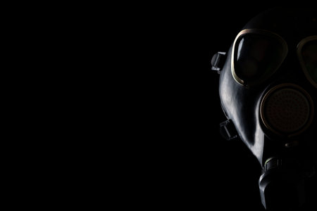 gas mask isolated on black background with space for text.