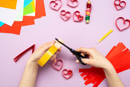 DIY instruction. Step by step guide. The process of making a garland of hearts for Valentine's Day.