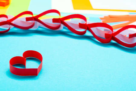 DIY instruction. Step by step guide. The process of making a garland of hearts for Valentine's Day.の写真素材