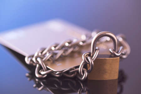 Credit card security, safe trading. Credit card lock chain.の写真素材