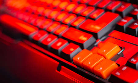 Gaming keyboard from computer close-up with color backlight.の写真素材