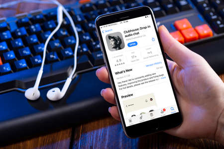 MINSK, BELARUS - March 22, 2021: Open the Clubhouse app on your smartphone. Clubhouse is an audio chat app.のeditorial素材