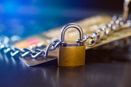 Credit card security, safe trading. Credit card closed with a padlock and chain.