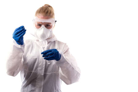Sampling from open water. A scientist or biologist takes a water sample. Water sample in a chemical test tube with a pipette.の写真素材