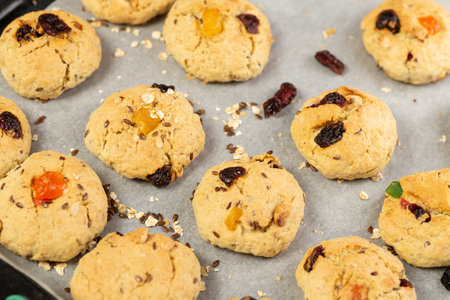 Refrigeration of freshly baked soft oatmeal cookies with raisins, candied fruits, flax and sesame...