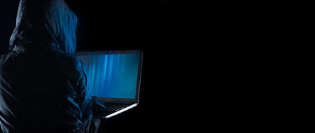 firearms at school. A teenager with a gun on the background of the school. A man goes to school with a gun. school violence.の写真素材