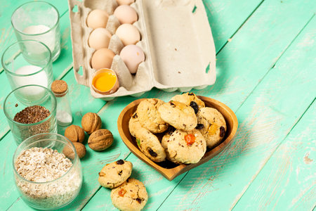 Ingredients for making oatmeal cookies on the table. Homemade oatmeal cookies.の写真素材