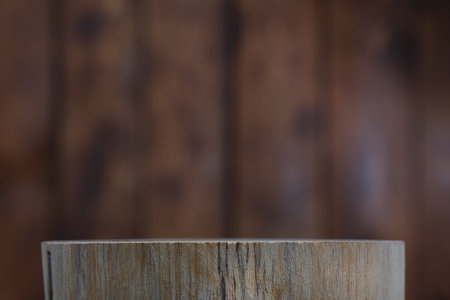 Wooden background - a round table with a wooden wall. Wooden table background. Empty displayの写真素材