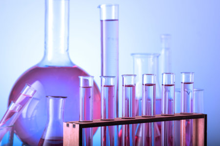 Chemical laboratory with glass test tubes and flasks.
