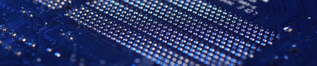 Motherboard close-up with contacts, desktop PC. Computer technology hardware components background.の写真素材