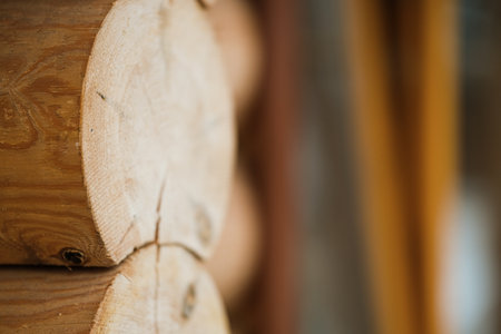 Natural background pattern of log wall. Construction of houses made of wood, rounded timber.の写真素材