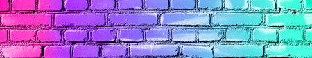 Black brick wall background with pink purple and blue neon lighting effect. glowing lights on the background of an empty brick wallの写真素材