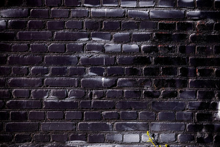Abstract black brick wall texture for pattern backgroundの写真素材