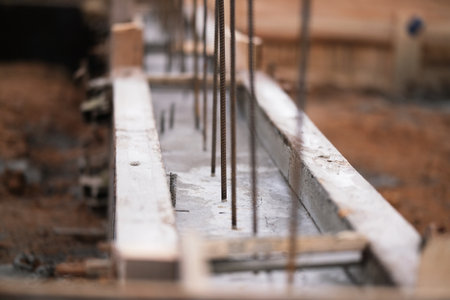 Construction of pile-grillage foundation. Monolithic foundation with metal reinforcement. Monolithic concrete foundation. House constructionの写真素材