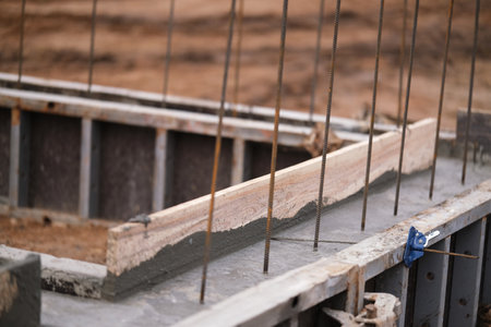 Construction of pile-grillage foundation. Monolithic foundation with metal reinforcement. Monolithic concrete foundation. House constructionの写真素材