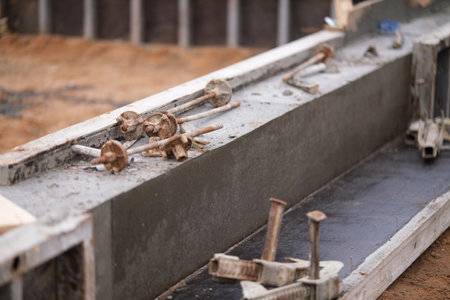 Construction of pile-grillage foundation. Monolithic foundation with metal reinforcement. Monolithic concrete foundation. House constructionの写真素材