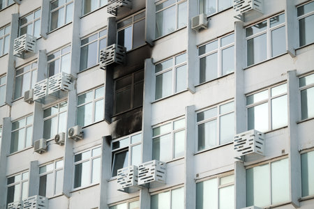 Consequences of a fire in a multi-storey building. Damaged multi-storey building, the aftermath of the explosionの写真素材