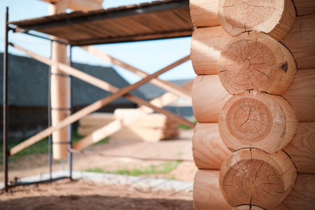 Wooden house building, house made of rounded logs, ecological houseの写真素材