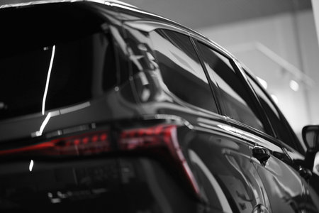 The body of a new car. Rear view. Car in the store showroom