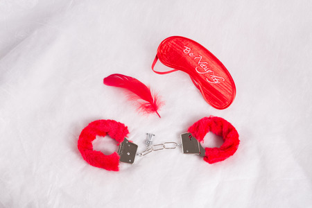goods in sex shop, toys for adults, sex shop, handcuffs, featherの写真素材