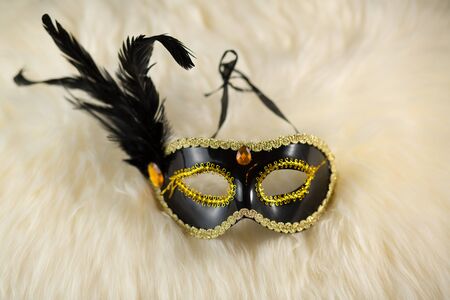 Black face pack on a black tableの写真素材