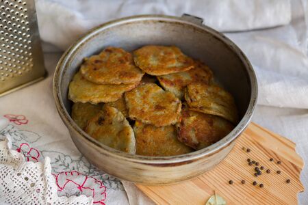 Potato pancakes with sour cream. National Russian dish.の写真素材