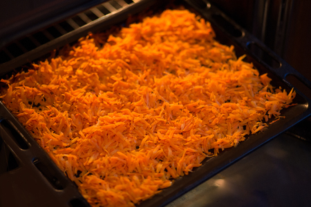 Vegetable orange boiled carrots on a table. Seasoning, spices.の写真素材