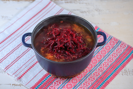 First course, soup borsch from cabbage and beet with greens.の写真素材