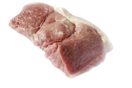 red meat for barbecue and grill. piece of fresh raw pork. isolate on white, selective focusの写真素材