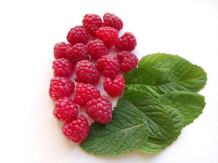 Heart made of raspberry and mint