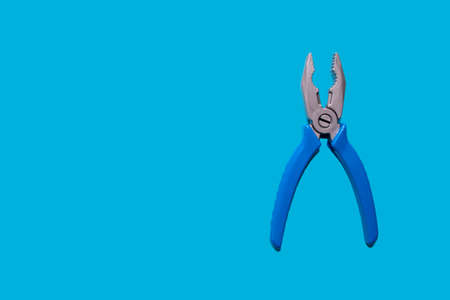 toy plastic plascomps, isolate on a blue background. Father day, construction industry, building and repair concept. Flat lay style with copy space for textの写真素材