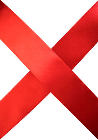 Silk red ribbon isolated on white. wrapping christmas gifts or birthday on white backgroundの写真素材