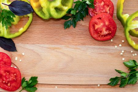 Food background with vegetables tomatoes, paprika, parsley, base on a wooden board with a place for...