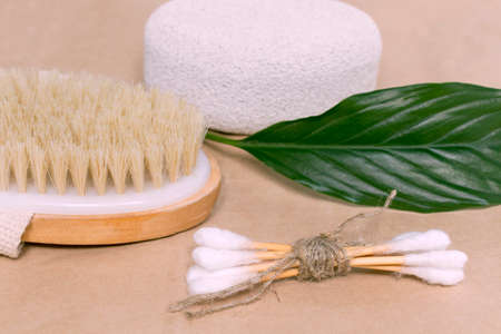 Body care accessories made from ecological material. Scrub, pumice stone, cotton swabs and a brush. Ecology, zero waste concept.の写真素材