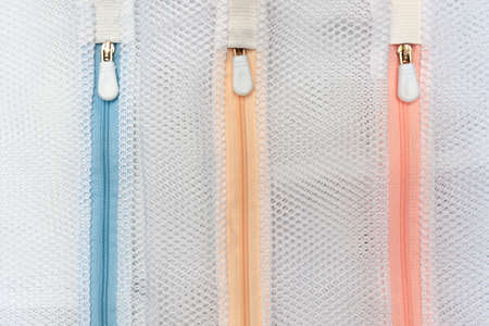 washing bag. special mesh bags with zipper for washing small clothing and accessories in them in washing machineの写真素材