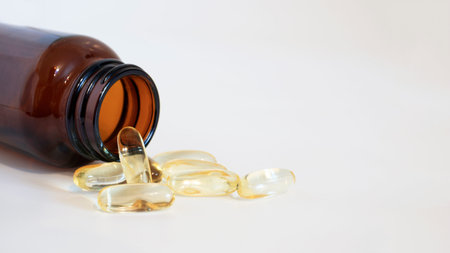 Omega 3 softgels. fish oil capsules. Source of omega-3 polyunsaturated fatty acids. Banner. copy...