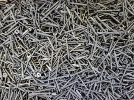 tapping screws made od steel, metal screw, iron screw, chrome screw, screws as a background, wood screw, . high quality photoの写真素材