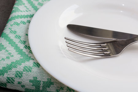 Set of cutlery knife, spoon, fork. Black background. top view. copy space High quality photoの写真素材