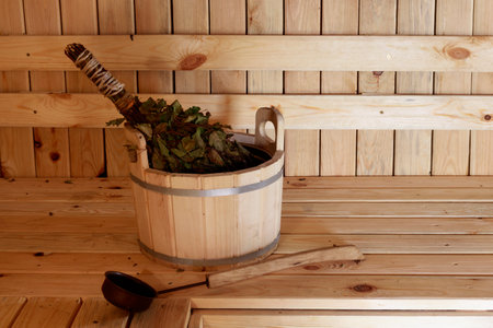 Front view of empty Finnish sauna room. Modern interior of wooden spa cabin with dry steam. high quality photoの写真素材