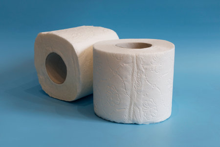 Toilet paper on a blue backgroundの写真素材