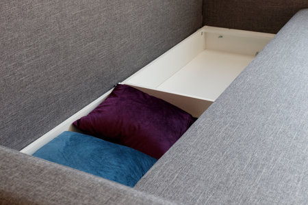 Sofa. Opened storage for bed linen. High quality photo.の写真素材