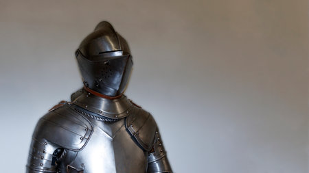 Closeup of a medieval knights suit of armor and helmet.の写真素材