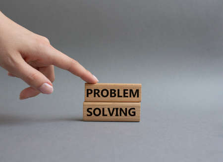 Learn new skills symbol. Concept words 'Learn new skills' on wooden blocks. Beautiful blue background. Business and Learn new skills concept. Copy space.の写真素材