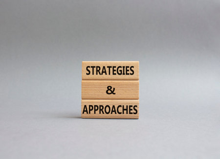 Flexible and agile symbol. Concept word Flexible and agile on wooden blocks. Beautiful grey background. Business and Flexible and agile concept. Copy spaceの写真素材