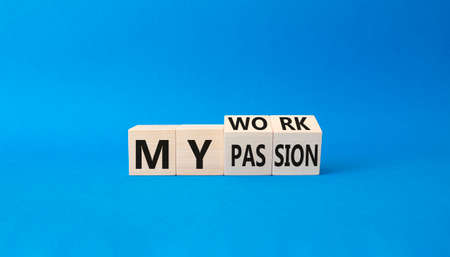 My work My passion symbol. Wooden cubes with words My work My passion. Beautiful blue background. Business concept. Copy space.の写真素材