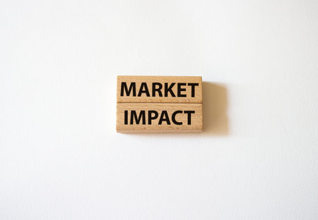 market impact. Concept word Market impact on wooden cubes. Beautiful white background. Business and...