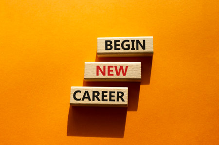 Start new career symbol. Concept word Begin new career on wooden blocks. beautiful orange background. Business and Begin new career concept. copy spaceの写真素材